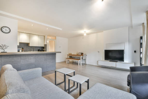 istock Modern living room in light colors combined with a small kitchen 1440783681
