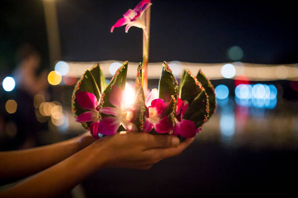 Loy Krathong Festival Themed Photo Loy Krathong holiday celebrated in Chiang Mai, Thailand. loi krathong stock pictures, royalty-free photos & images