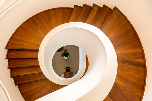 Spacious, clean and bright indoor spiral staircase
