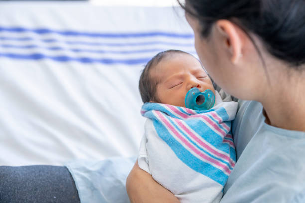 istock Mother Bonding with her Newborn 1440786618