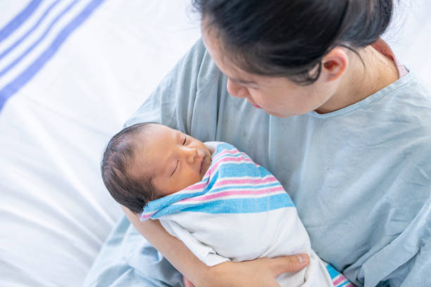 istock Newborn in Mothers Arms 1440786619