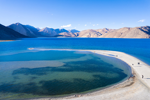 Aerial landscape of Pangong Lake  and mountains with clear blue sky, it's a highest saline water lake in Himalayas range, landmarks and popular for tourist attractions in Leh, Ladakh, India, Asia