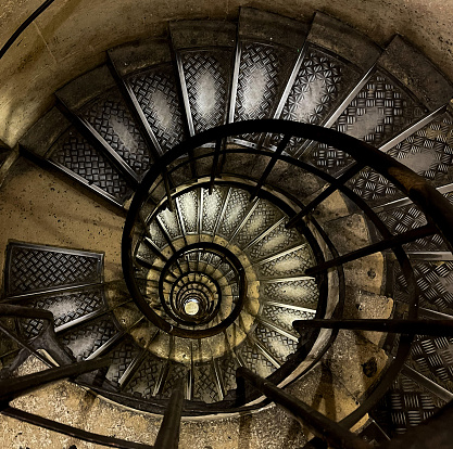 A vertiginous shot of the winding staircase of the Arc de Triomphe—all 284 steps.