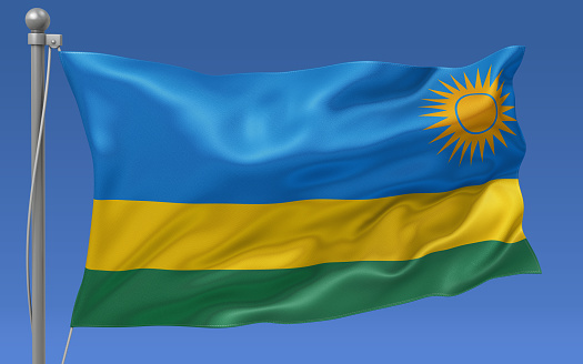 Rwanda flag waving on the flagpole on a sky background