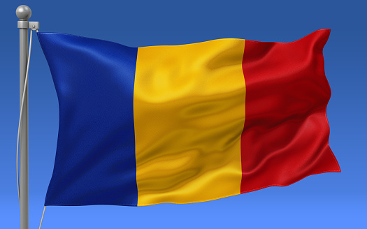 Romania flag waving on the flagpole on a sky background