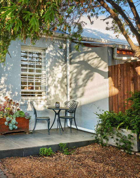 istock Backyard patio of a small home 1440794510