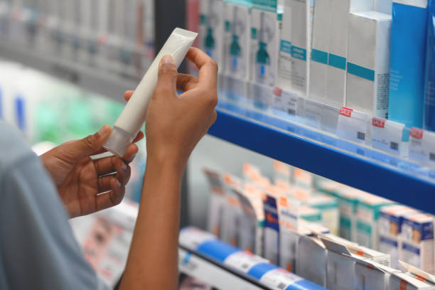 istock Young woman choosing hand cream 1440797628