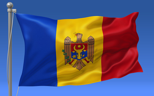 Moldova flag waving on the flagpole on a sky background