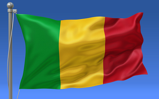 Mali flag waving on the flagpole on a sky background