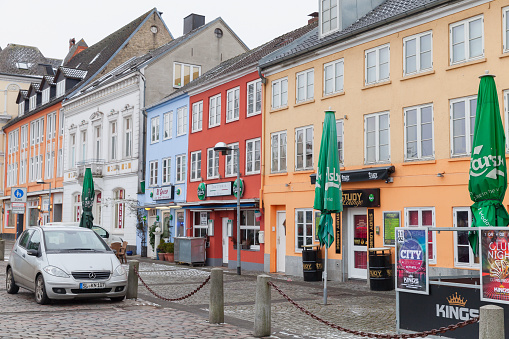 Flensburg, Germany - February 9, 2017: Flensburg old town street view with traditional colorful living houses