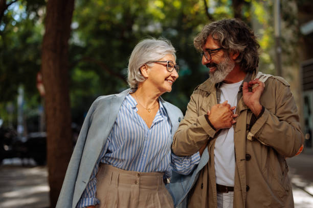 istock Cheerful senior couple taking a walk outside. 1440799849