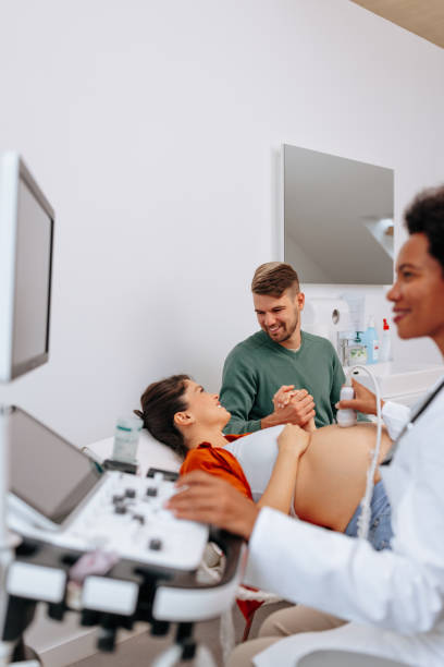 istock Young couple at gynecologist. 1440799944