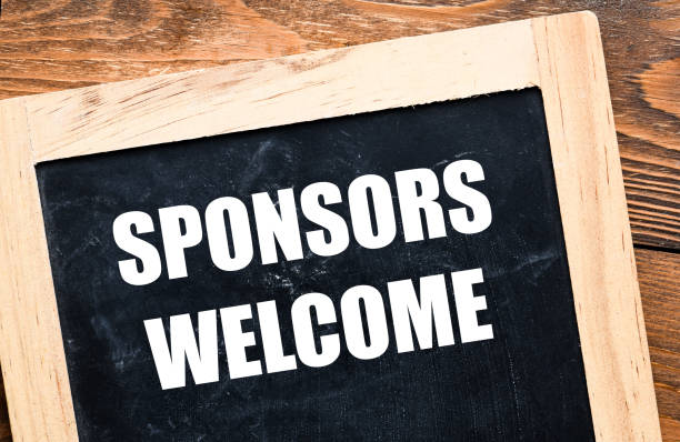 istock SPONSORS WELCOME words on chalk board and wooden table. 1440805798