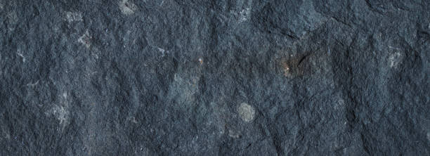 istock texture of dark nature stone - grunge stone surface background 1440809591