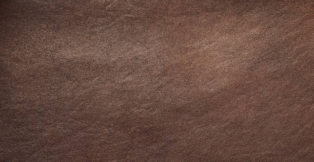 istock texture of dark brown colored raw leather background 1440809976