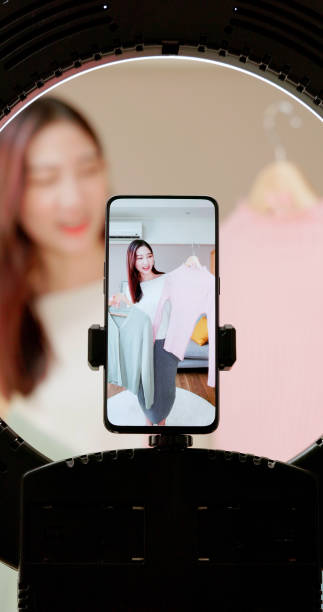 istock woman live stream selling clothes 1440815202