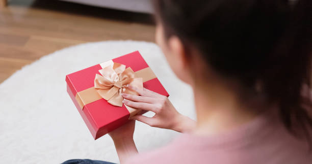 istock asian woman has gift surprise 1440815413