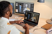 Man building digital 3D models