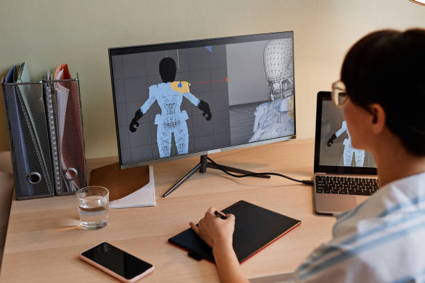 istock Designer building digital 3D models for videogame characters 1440817246