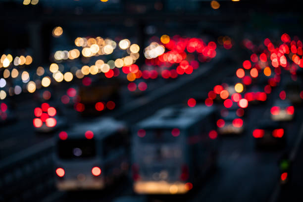 Defocused Traffic in the Dark on Multiple Lane Highway stock photo