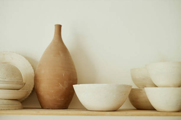 istock Raw handmade ceramics on shelf in pottery studio 1440817568