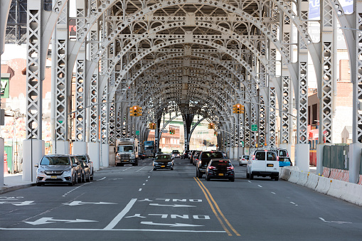 Traffic under Riverside Viaduct, Harlem, Upper Manhattan, New York City, America, USA.