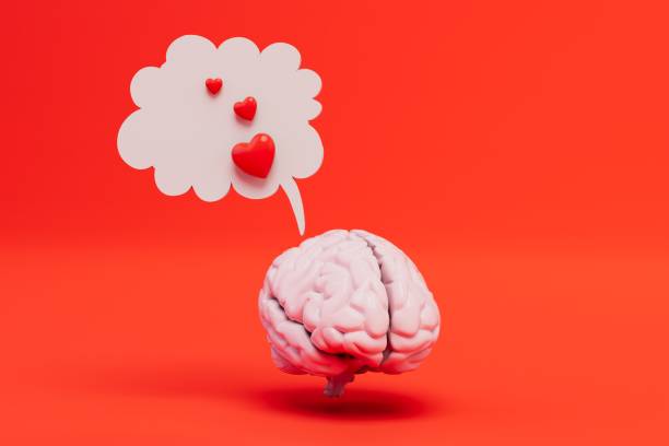 istock thoughts of love. a brain and a cloud with hearts on a red background. 3D render 1440823490