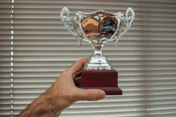 istock glad to win a trophy as the best 1440829615