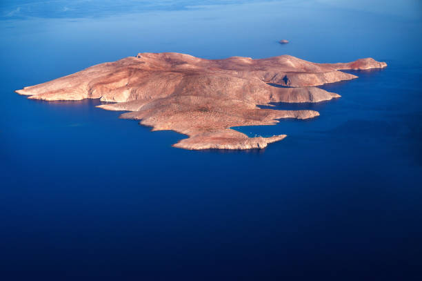 Aerial view to Dia island in blue sea water, Crete. stock photo