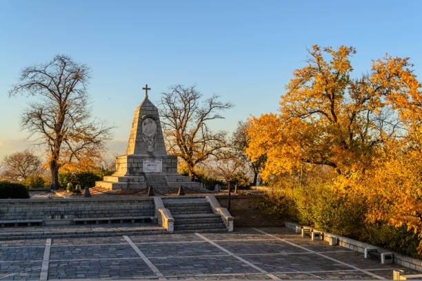 Monument of Tsar Alexander I with fall foliage in Plovdiv, Bulgaria.