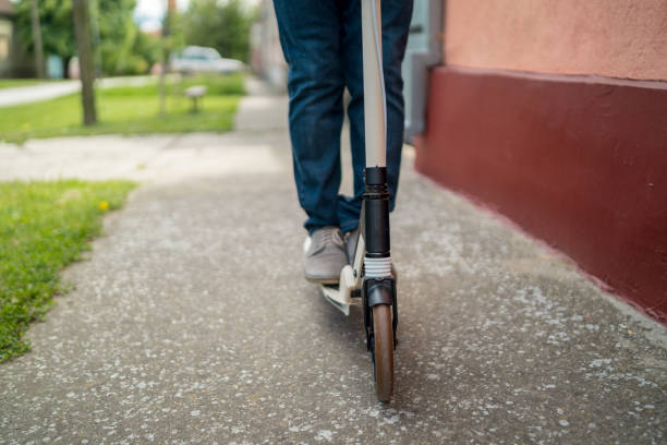 istock Fashionable senior man on a push scooter 1440843926