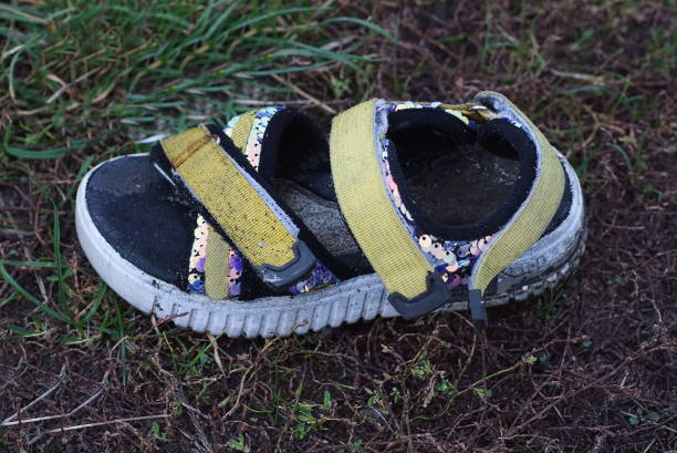 istock one small old dirty colored summer sandal 1440844094