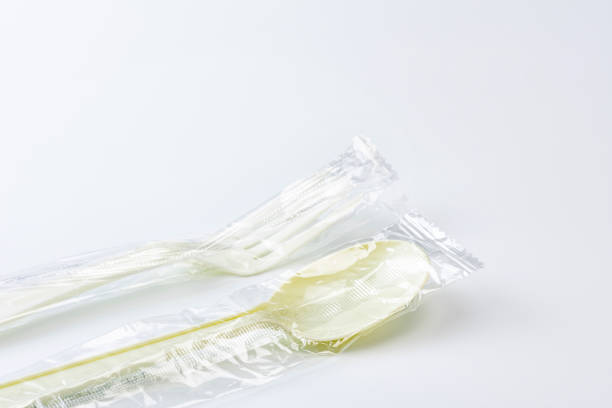 istock Disposable plastic products such as spoons and forks on a white background, SDGs, environmental issues 1440847296