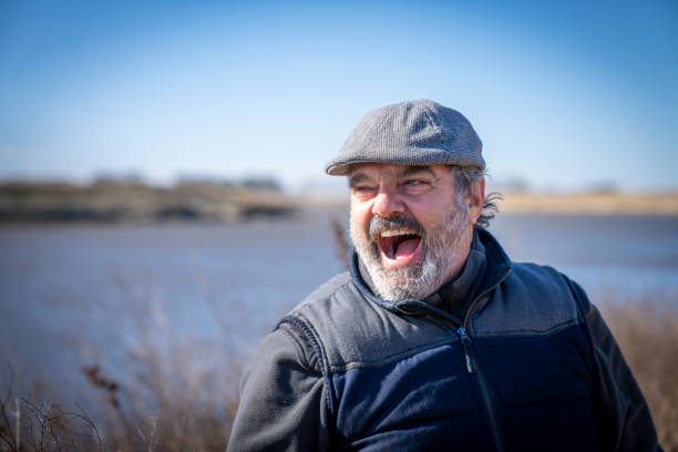 istock Portrait of laughing hispanic man 1440848048