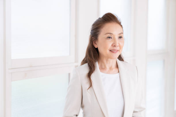 istock senior age woman, business 1440861956