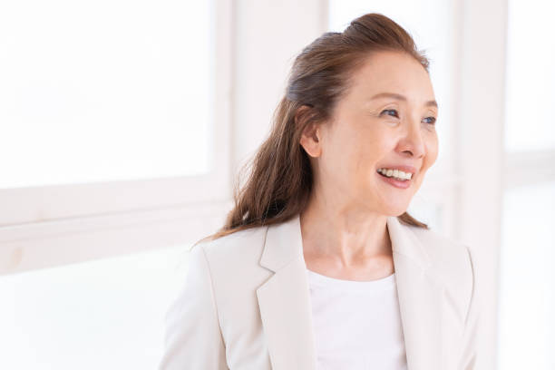 istock senior age woman, business 1440861972