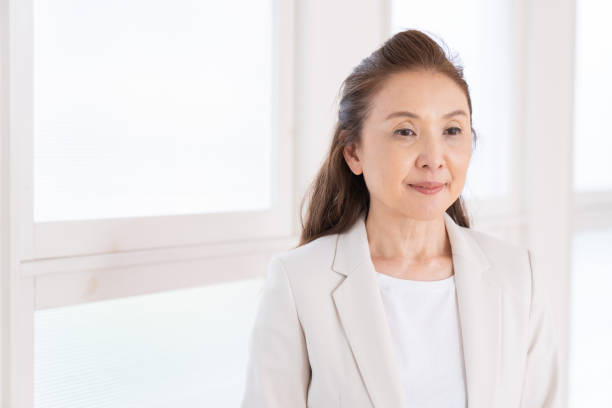 istock senior age woman, business 1440861978