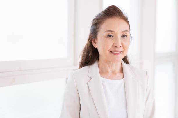 istock senior age woman, business 1440862506