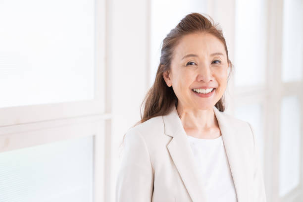 istock senior age woman, business 1440862554