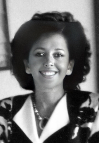 Black and white portrait of African American women sitting at desk circa 1950's