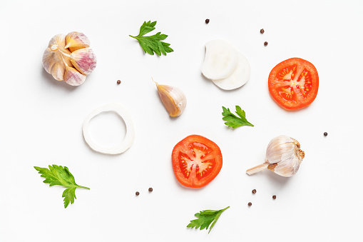 Various spices and herbs on white. Flat lay composition. Food background