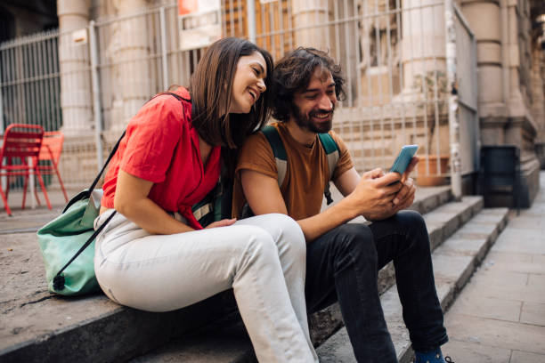 istock Portrait of a young couple taking a break while sightseeing Barcelona 1440863381