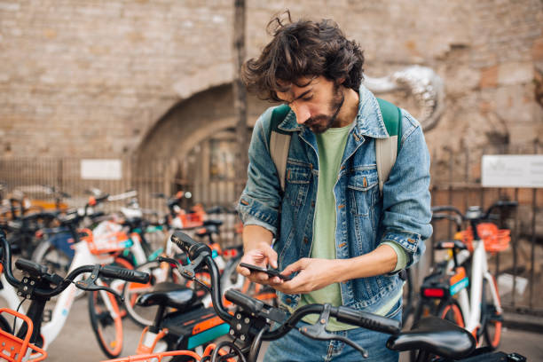 istock Young man on vacation renting an E-bike 1440863388