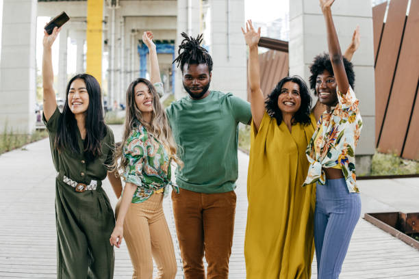 istock Dancing young group of friends 1440864177