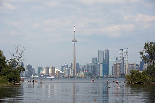 Center Island  is one of the most popular summer destinations by Torontonians and one of the ways they spend their time in the island is by doing some water sports like Paddle Boarding.
