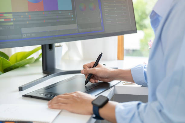 istock Cropped shot of creative man using graphic tablet, working on new project at modern office. 1440867995