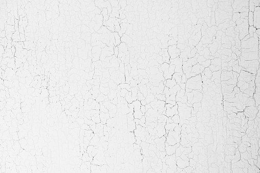 White wooden background, old wood board painted with white paint. Cracks textures on a paint, vintage backdrop