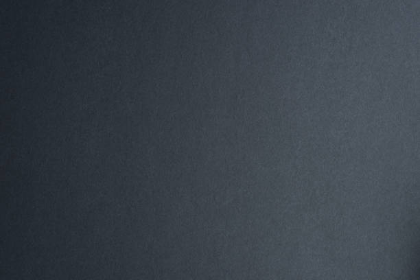 Abstract modern black background. Black paper texture. Black or Dark gray textured design paper