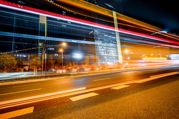 istock the light trails on the modern building background 1440878616