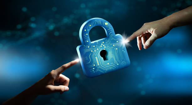 istock Businessman hand pointing Keyhole in data security. 1440880386